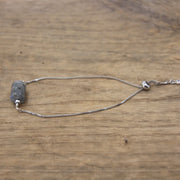 Talisman Gris